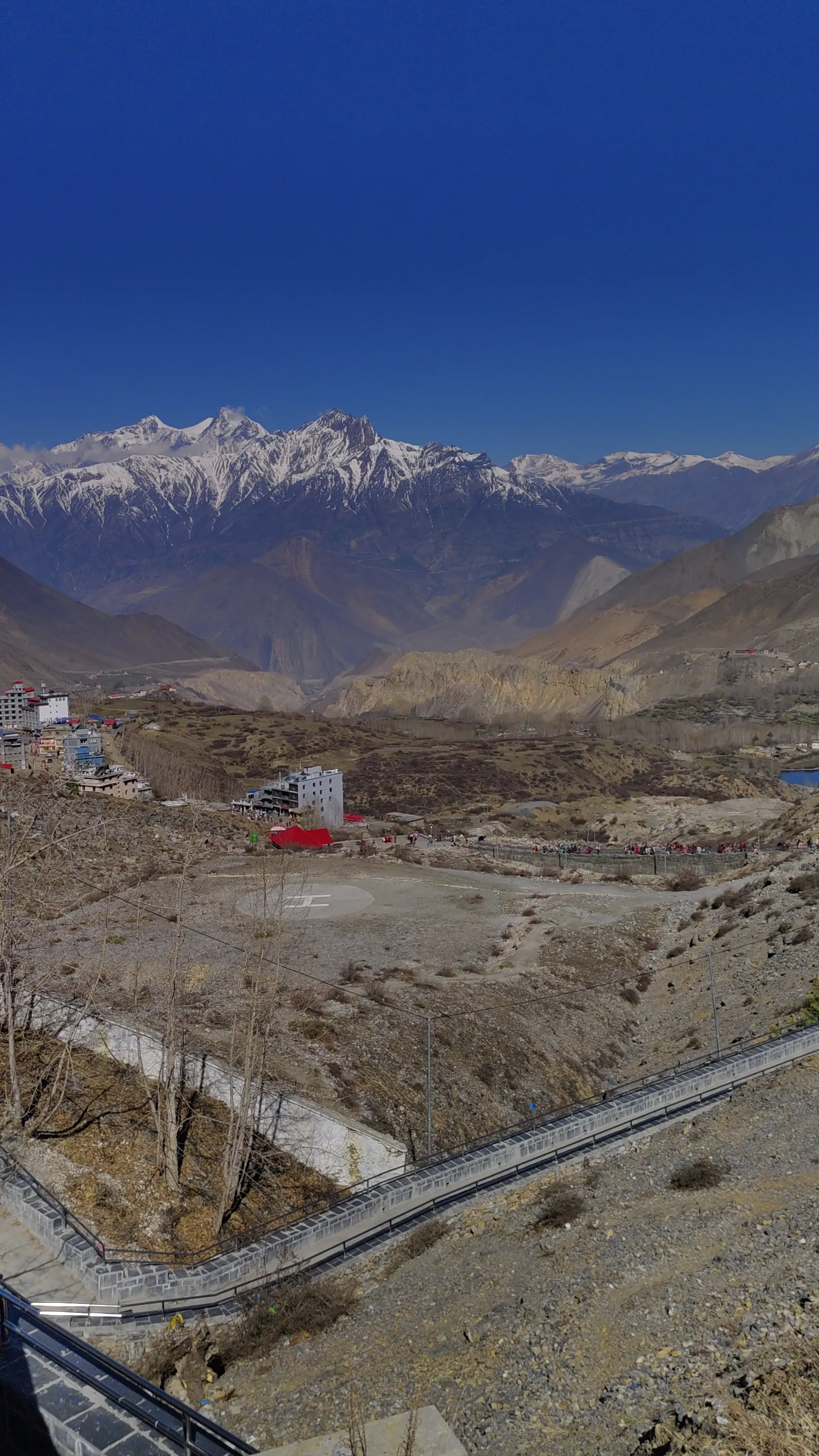 Aerial view of Jomsom town with Kali Gandaki valley and peaks behind